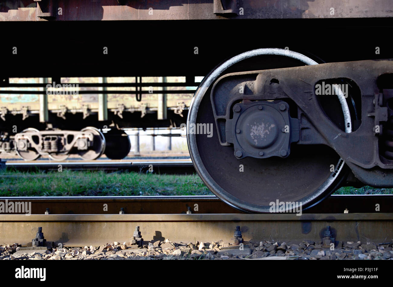 Detailed photo of railway freight car. A fragment of the component