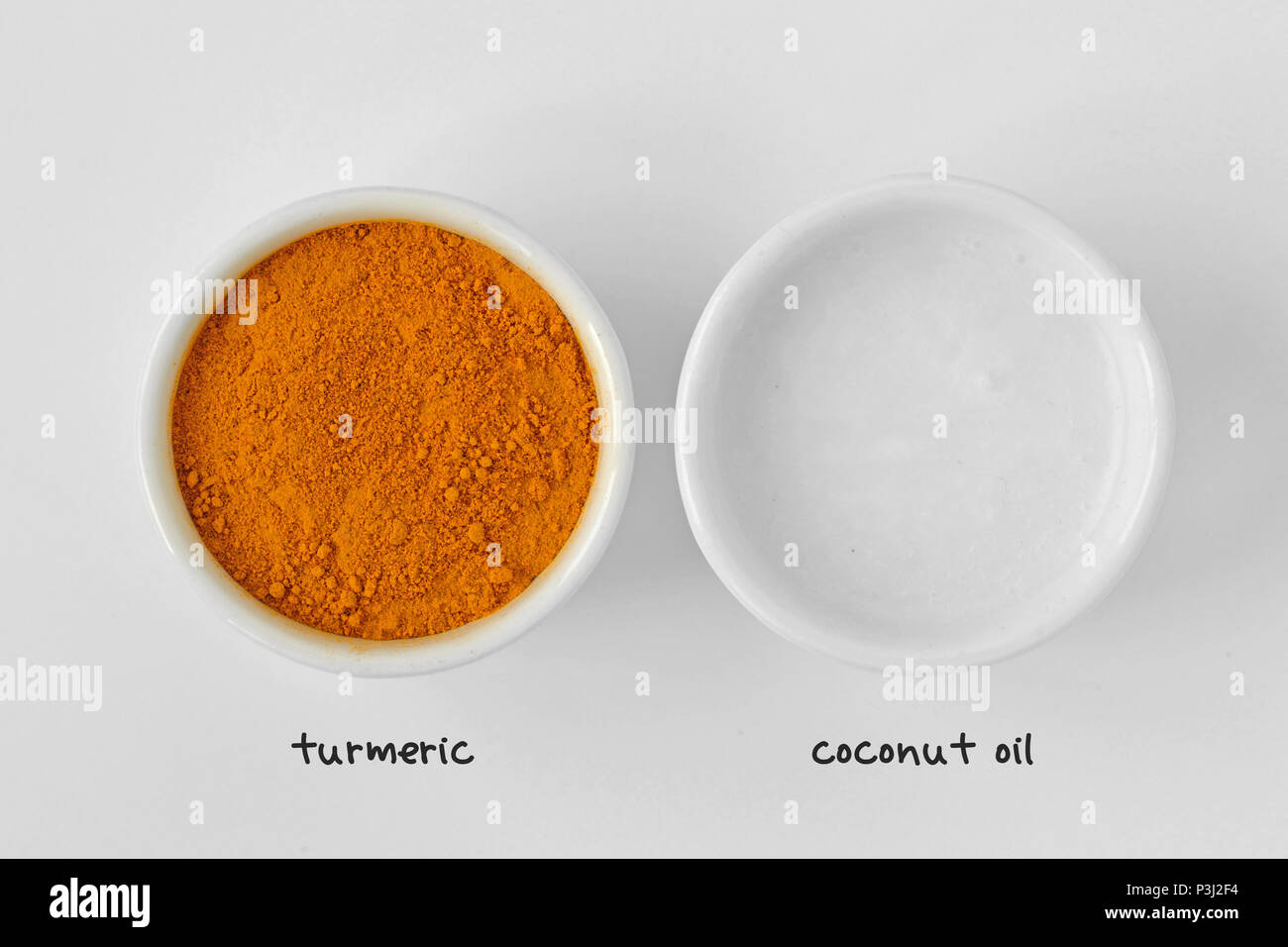 Homemade face mask made out of turmeric and coconut oil Stock Photo - Alamy