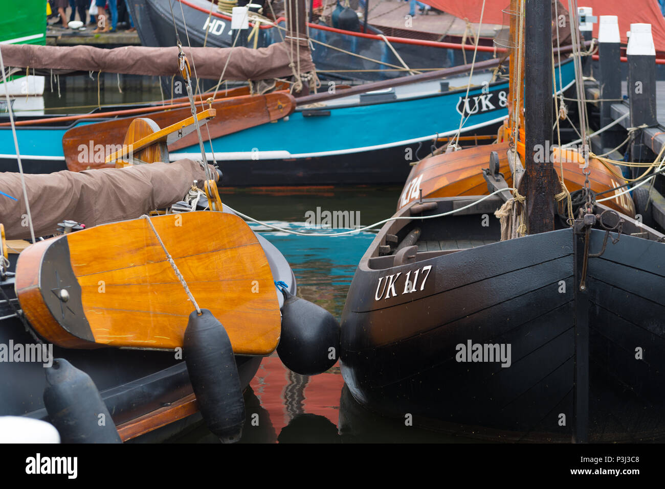 URK, NETHERLANDS - MAY 19, 2018: traditional wooden fishing boats in the harbor of Urk. Urk is on of the best-known fishing villages in the country wi Stock Photo