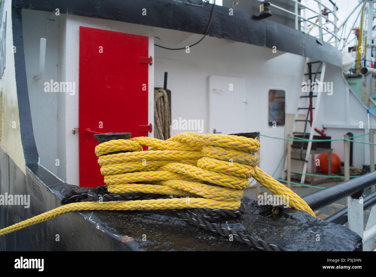 yellow rope on a fishing boat Stock Photo - Alamy