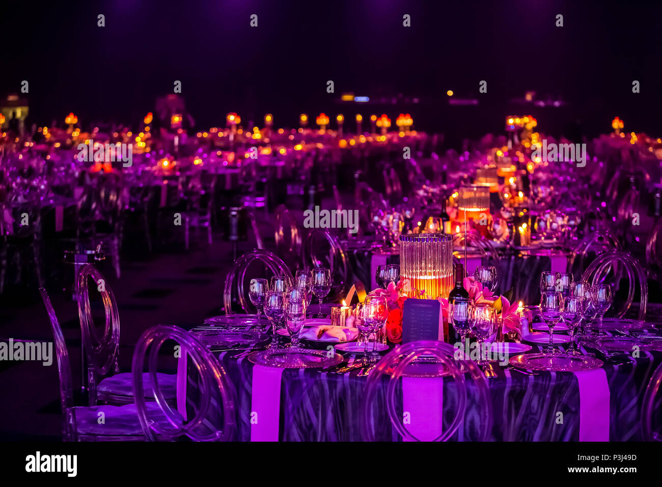 Pink and Purple Decor for corporate gala dinner banquet event Stock