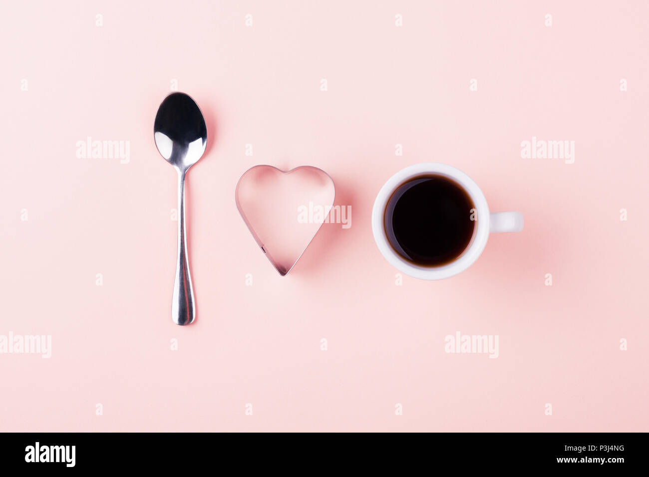 I love coffee concept with teaspoon, shape of heart and cup of coffee