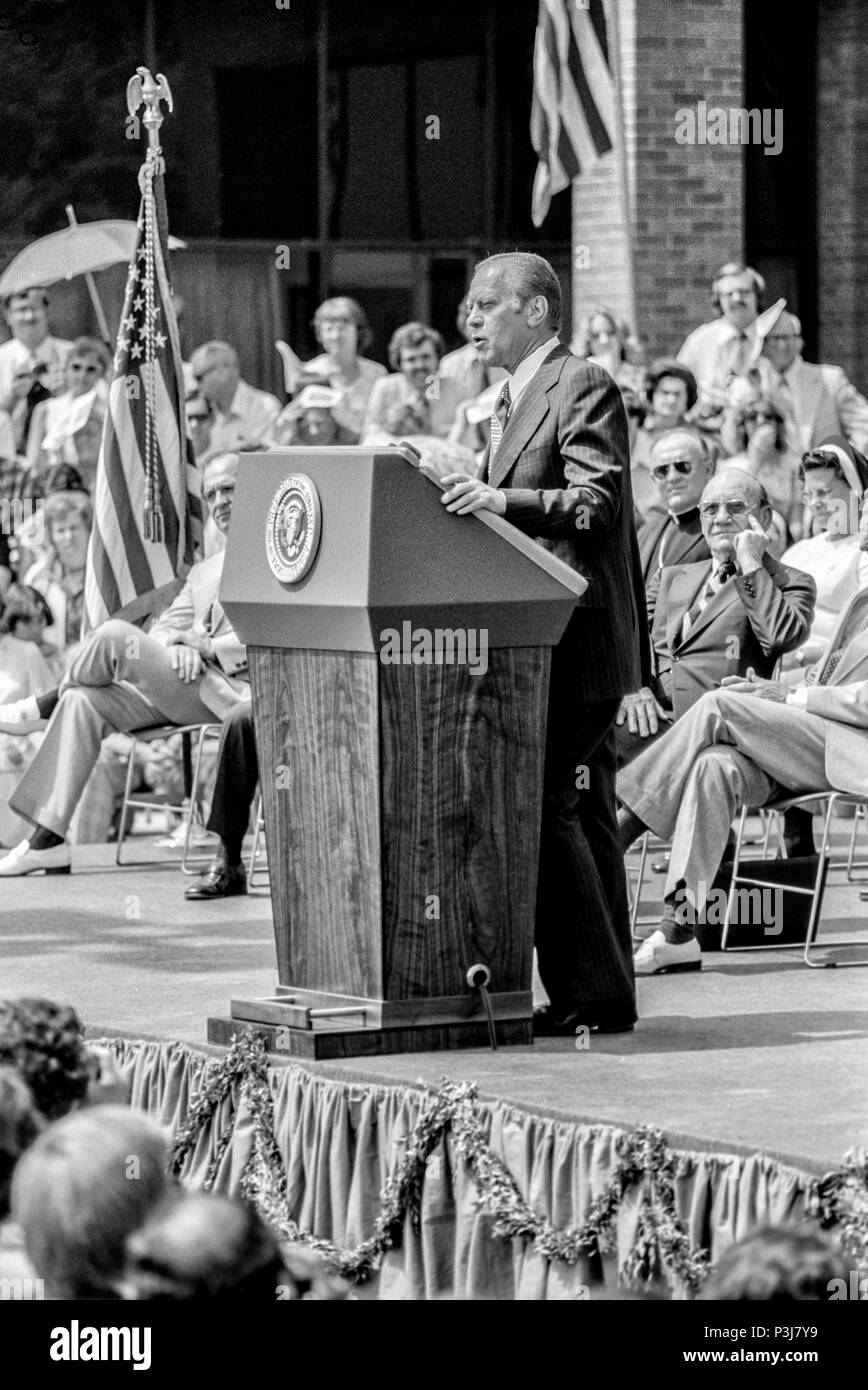FORT SMITH, AR, USA - AUGUST 10, 1975 -- President Gerald Ford addresses several thousand newly-arrived refugees from Vietnam right after South Vietnam collapsed at the end of the Vietnam War. Stock Photo