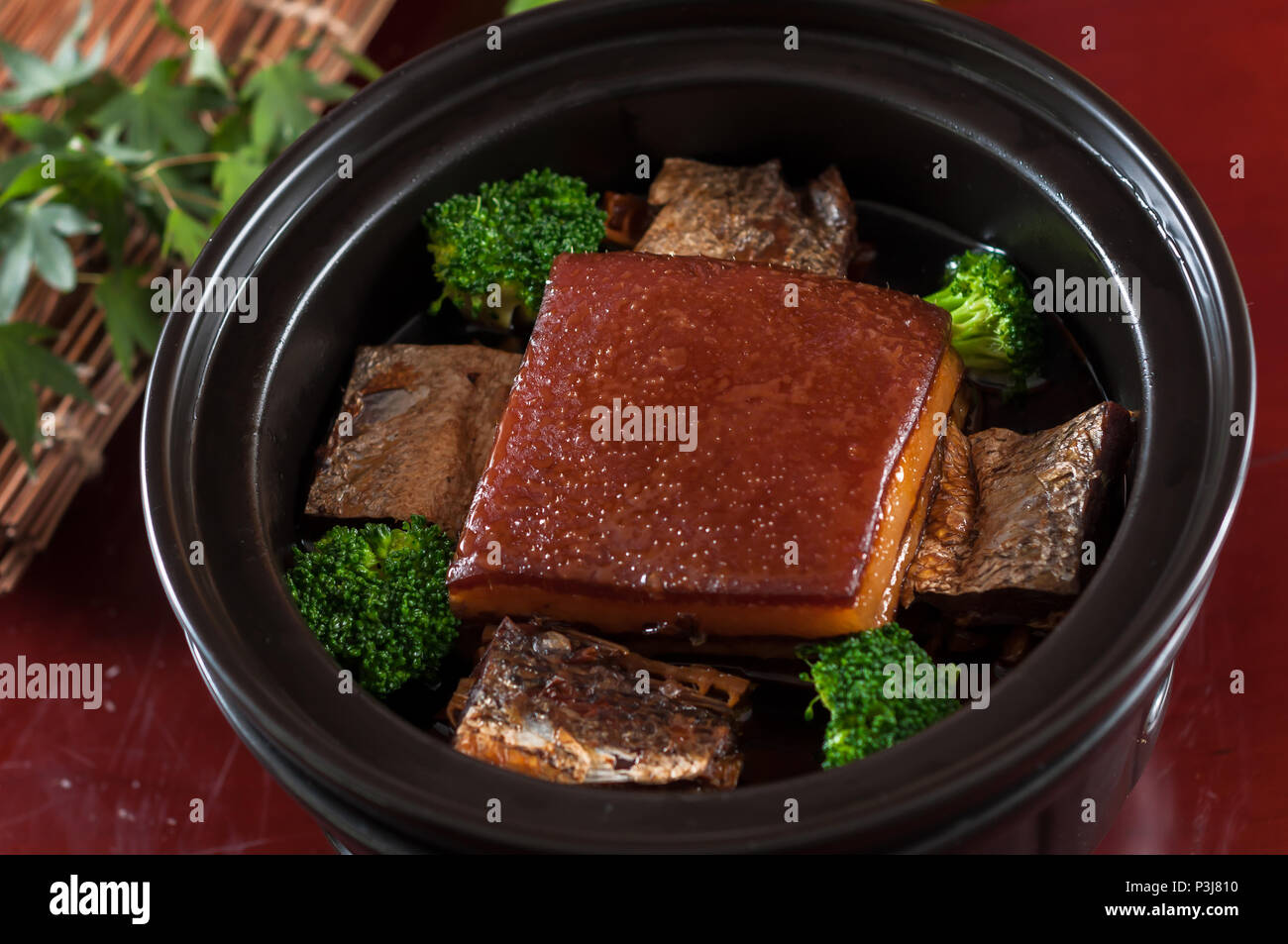 Braised pork in brown sauce with salted fish Stock Photo Alamy