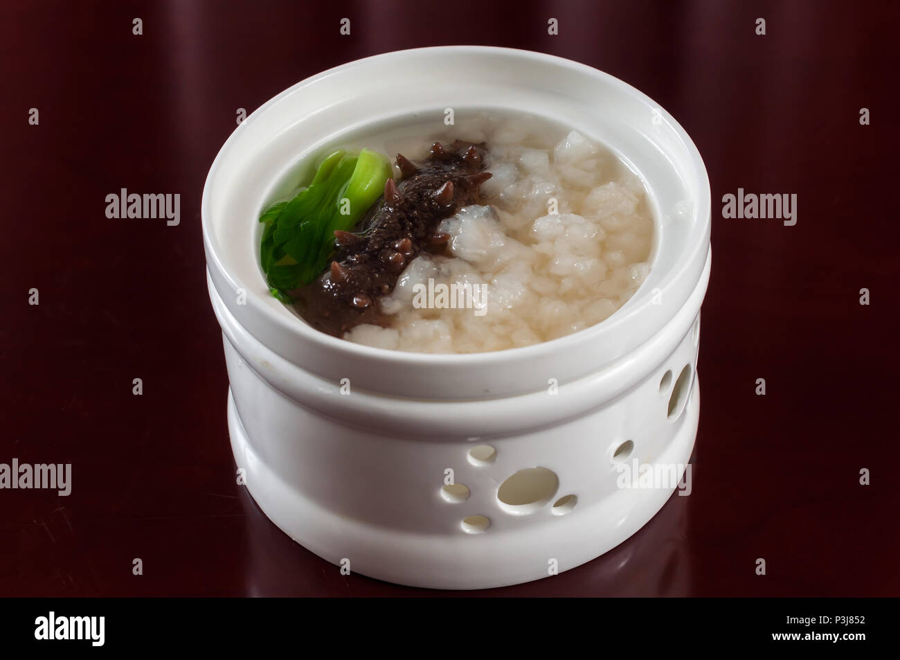 Braised sea cucumber with chicken soup and Chinese Forest Frog Stock