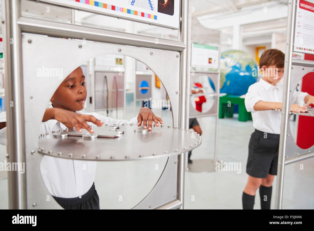 School kids doing science tests at a science centre Stock Photo - Alamy
