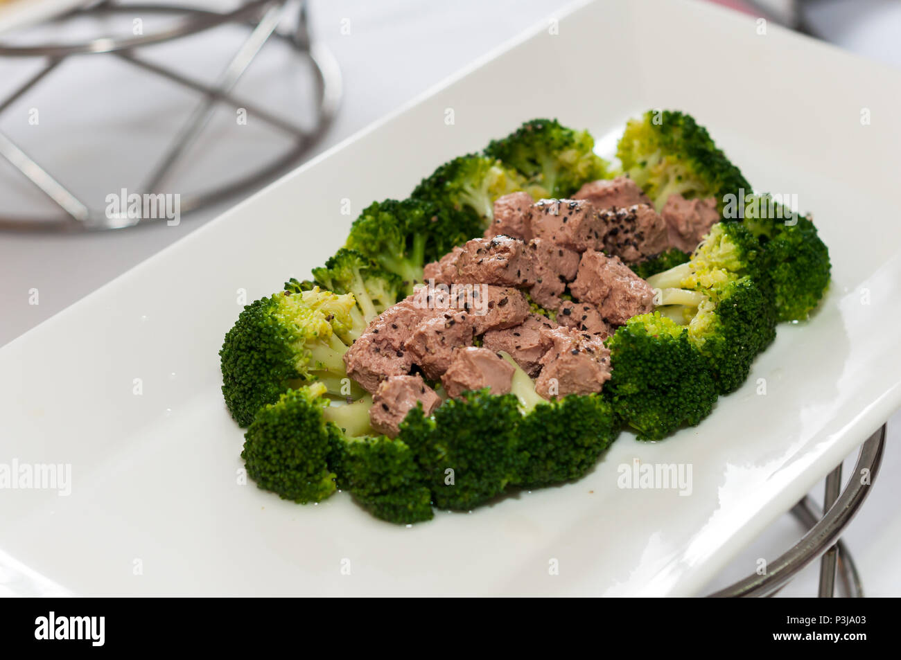 Foie gras and broccoli salad Stock Photo