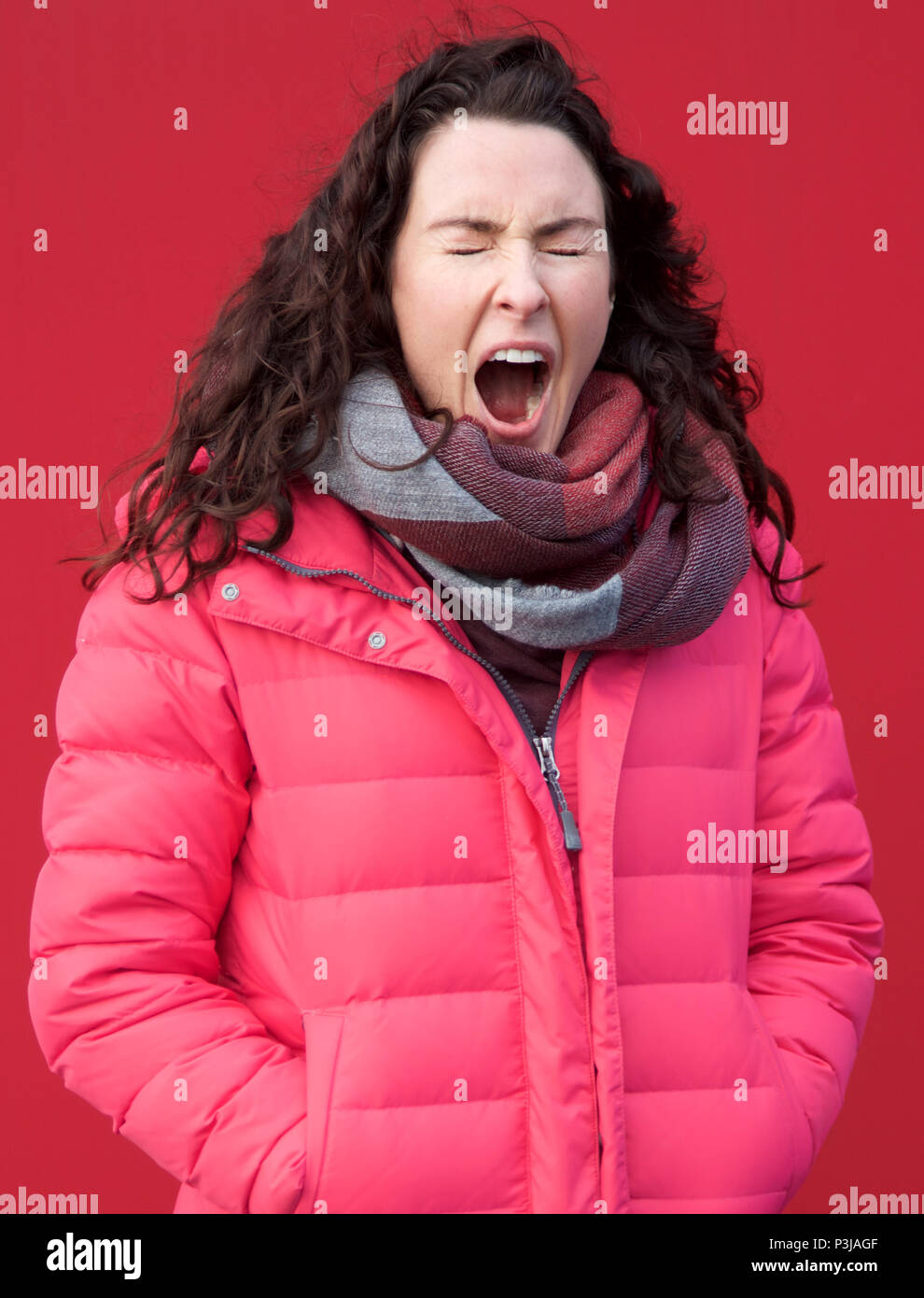 Woman in red jacket hi-res stock photography and images - Alamy