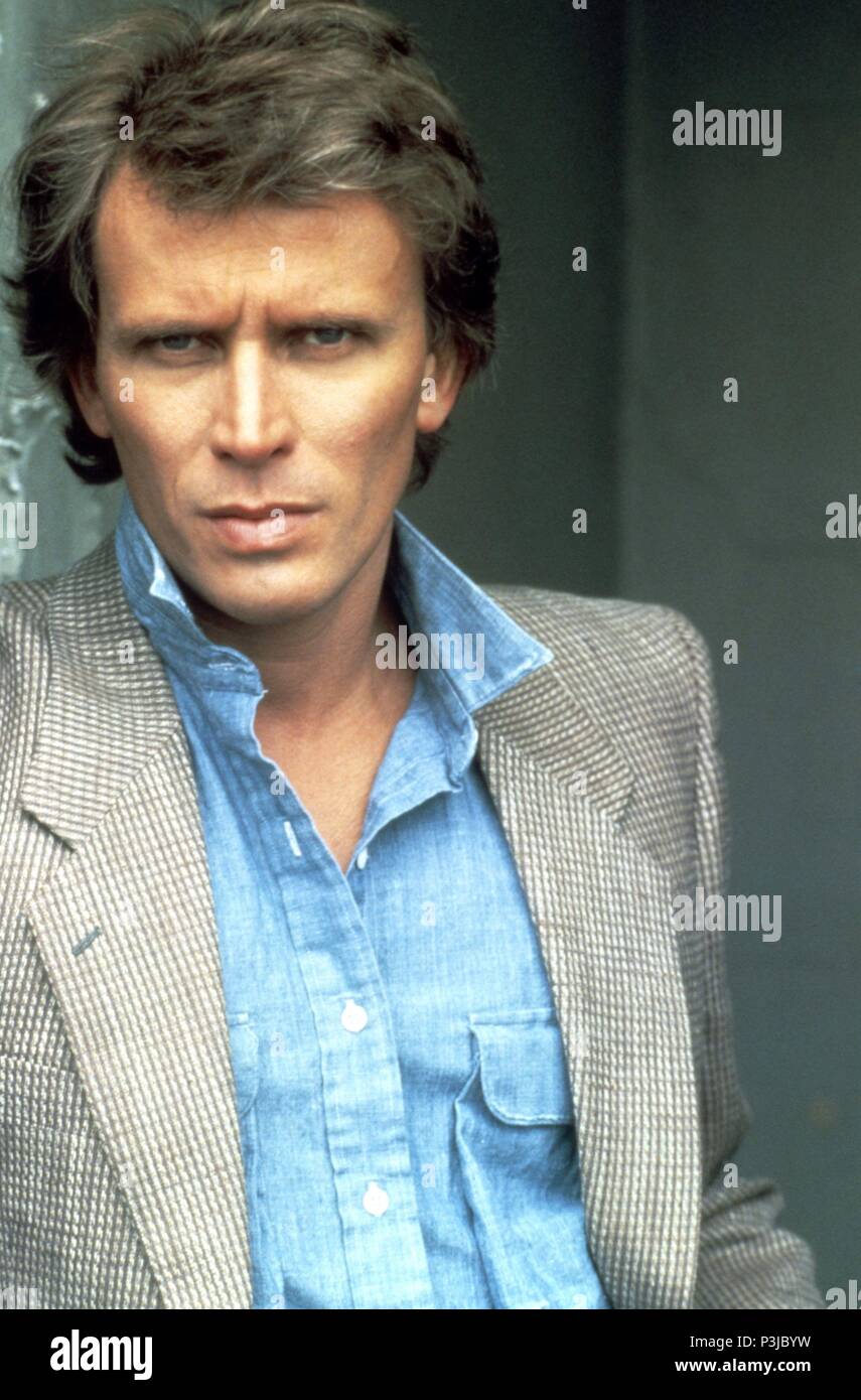 Year: 1984. Stars: PETER WELLER Stock Photo - Alamy