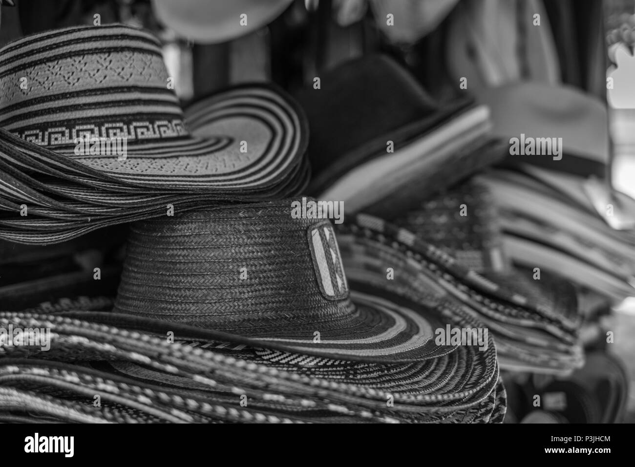 Close up on sombreros and artificial accessories in a Colombian market Stock Photo