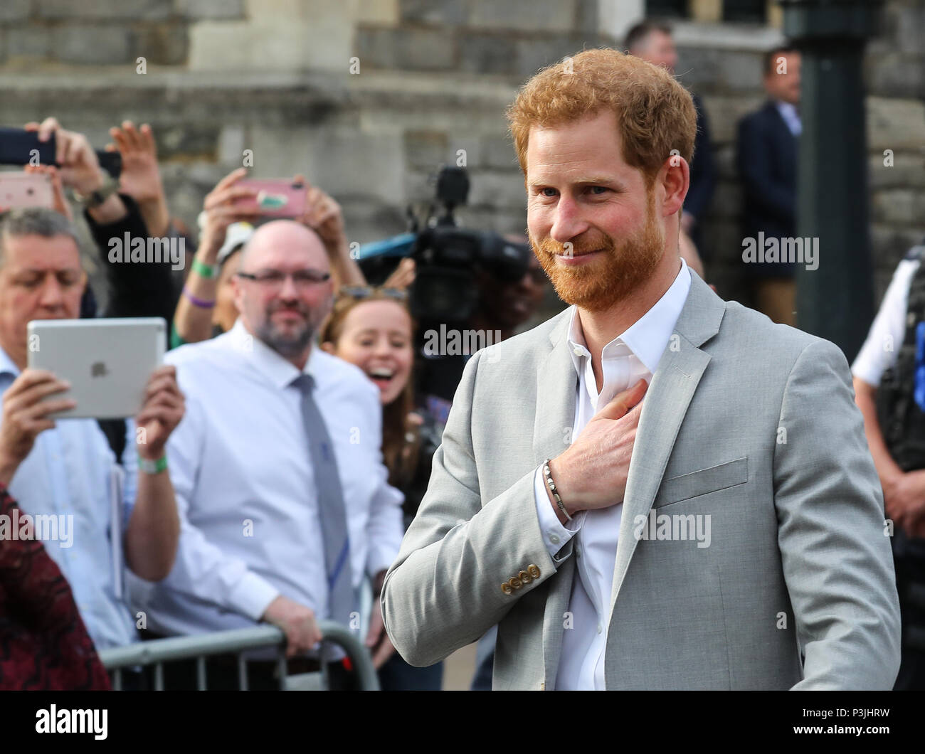 Prince Harry and Prince William greet the crowds outside Windsor Castle on the evening before Prince Harry's wedding to Meghan Markle  Featuring: Prince Harry Where: Windsor, United Kingdom When: 18 May 2018 Credit: John Rainford/WENN Stock Photo