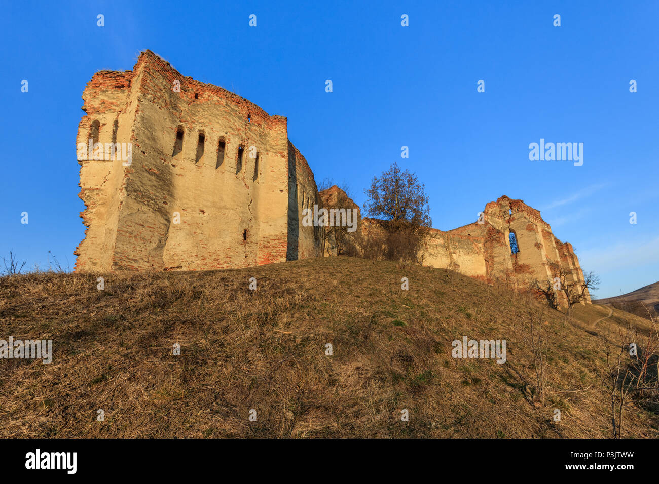 The Slimnic fortress on the hills over Slimnic village. Transylvania ...