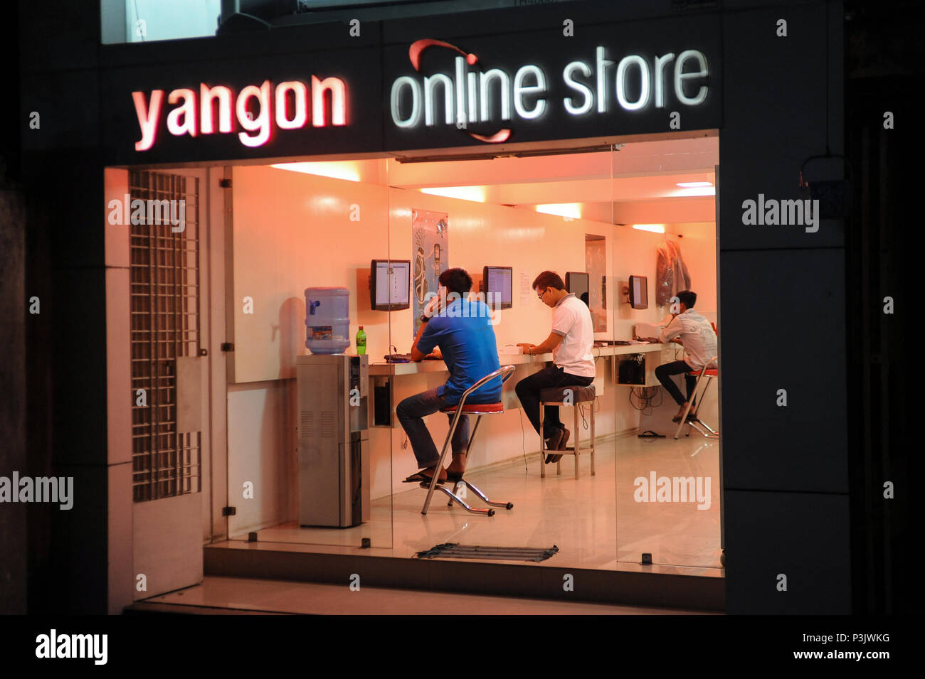 Yangon, Myanmar, customers in an internet cafe Stock Photo