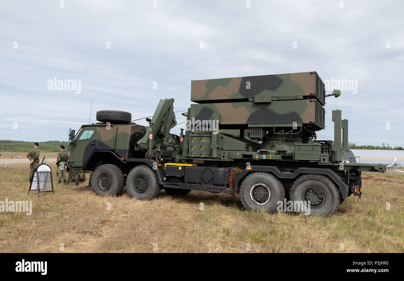 Sisu E13TP 8 x 8 high-mobility tactical military truck as launcher vehicle of the NASAMS 2 surface-to-air missile system of the Finnish Army. Stock Photo
