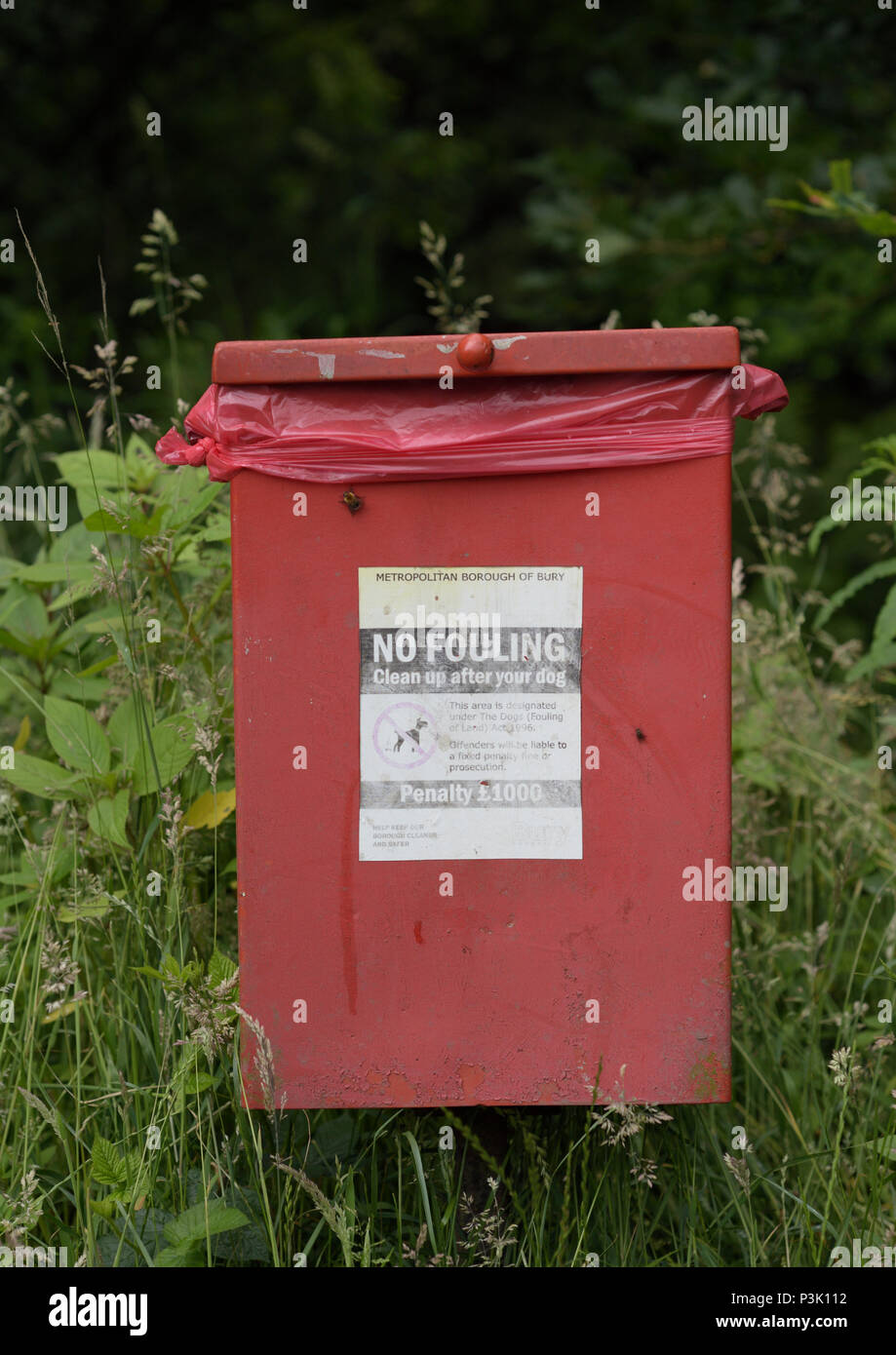 Dog waste bin in countryside, burrs country park bury lancashire uk Stock Photo Alamy