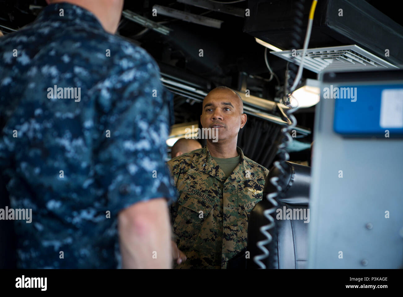 160708-M-QQ799-134 JOINT BASE PEARL HARBOR-HICKAM (July 8, 2016) Brig. Gen. Brian Cavanaugh, U.S. Marine Corps Forces, Pacific deputy commander, visits USS Coronado during Exercise Rim of the Pacific 2016. Twenty-six nations, 49 ships, six submarines, about 200 aircraft, and 25,000 personnel are participating in RIMPAC from June 29 to Aug. 4 in and around the Hawaiian Islands and Southern California. The world’s largest international maritime exercise, RIMPAC provides a unique training opportunity while fostering and sustaining cooperative relationships between participants critical to ensurin Stock Photo