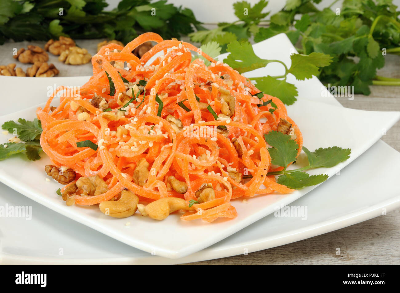 Carrot ribbon salad bathed with yoghurt dressing seasoned with fried