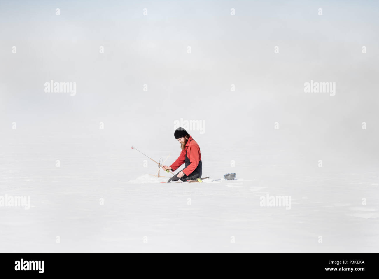 Traditional ice fishing man Yukon Canada Stock Photo Alamy