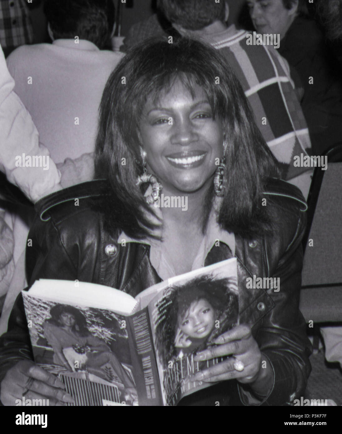 The Day Mary Wilson of “The Supremes” Rocked Wilkes Barre Pennsylvania's Public Square! Super Star Mary Wilson of Motown Record”s 'The Supremes'  visited Wilkes Barre's Fine Arts Fiesta in 1991.She Shocked & Rocked--arguably the largest crowd in Fiesta history.  Mary Wilson was simply Rockin' the place.Mary Wilson, of the Supremes, was giving them everything they had hoped for.The faces in the crowd displayed overwhelming admiration for this former Motown Star. Could one women totally capture the hearts and souls of so so many people? The answer was “You bet your Sweet Supremes she could” Stock Photo