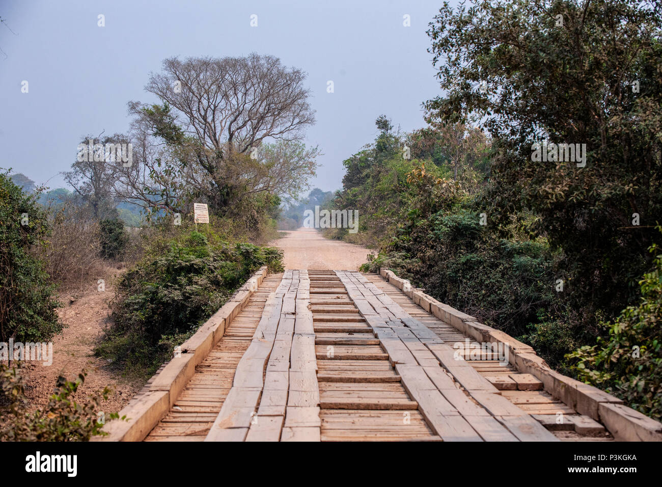 Wooden bridge on the trans-pantanal highway Stock Photo