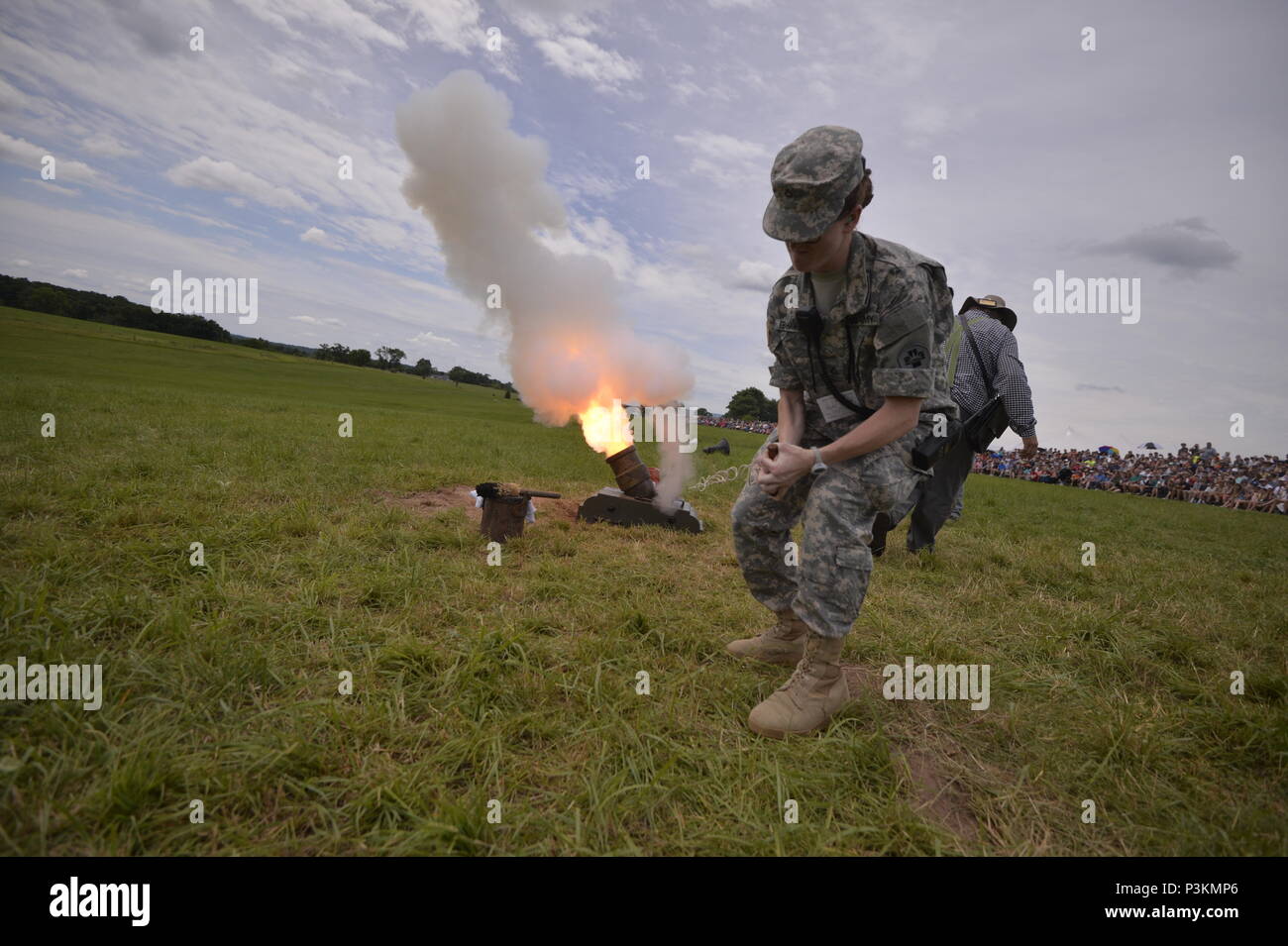 GETTYSBURG, PA - Private First Class Marina Eberhart, a Combat Medic with the 865th Army Combat Support Hospital, Ashley Detatchment, pulls the handle on a Civil War-era mortar during a demonstration at the 153rd anniversary of the Battle of Gettysburg on July 3rd, 2016.    The Battle of Gettysburg took place over three days, from July 1–3, 1863, in and around the town of Gettysburg, Pennsylvania. The battle was described as the turning point of the Civil Warm and involved the largest number of casualties of the conflict, ending with over 23,000 casualties on the Union side, and an estimated s Stock Photo