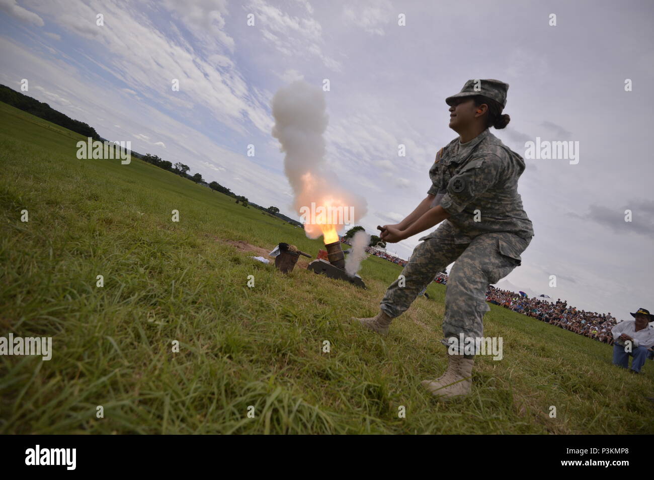 GETTYSBURG, PA - Private First Class Analise Arvelo, a Combat Medic with the 865th Army Combat Support Hospital, Ashley Detatchment, pulls the handle on a Civil War-era mortar during a demonstration at the 153rd anniversary of the Battle of Gettysburg on July 3rd, 2016.    The Battle of Gettysburg took place over three days, from July 1–3, 1863, in and around the town of Gettysburg, Pennsylvania. The battle was described as the turning point of the Civil Warm and involved the largest number of casualties of the conflict, ending with over 23,000 casualties on the Union side, and an estimated si Stock Photo