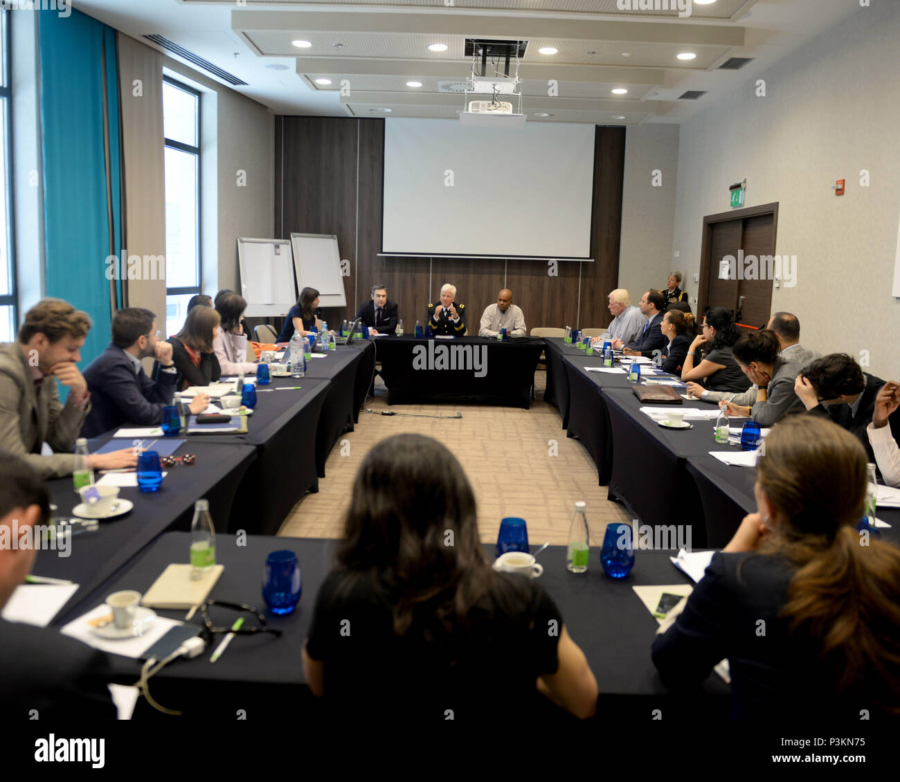 Brig. Gen. Giselle Wilz, NATO Headquarters Sarajevo commander, and Rohan Maxwell, the commander’s senior political-military advisor, met with twenty rising leaders under 35 years old at an event organized by the Atlantic Council of Washington, D.C. in Sarajevo, Bosnia and Herzegovina, July 4, 2016. Stock Photo