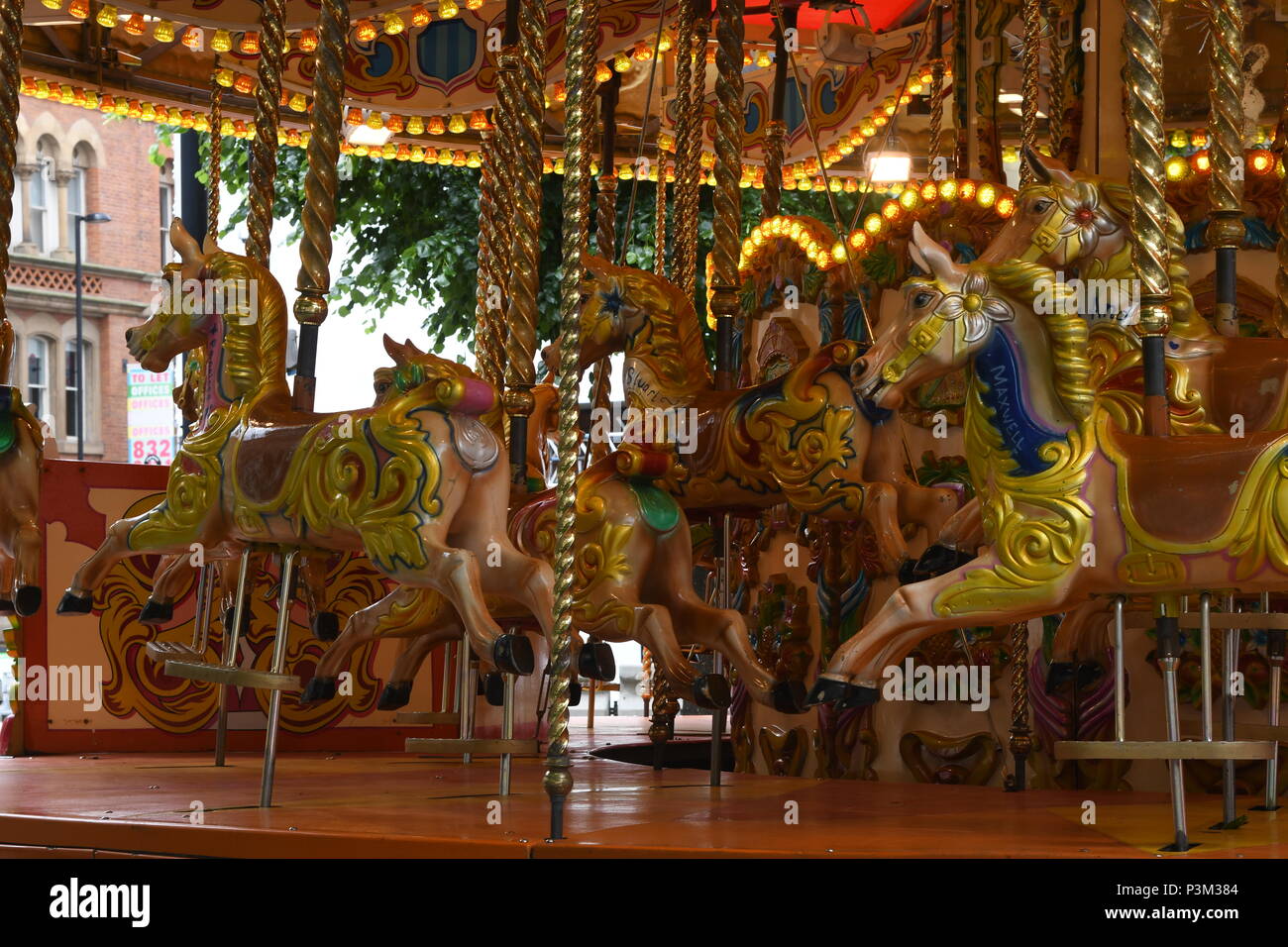 Tradirtionally colourful carousel ride hi-res stock photography and ...