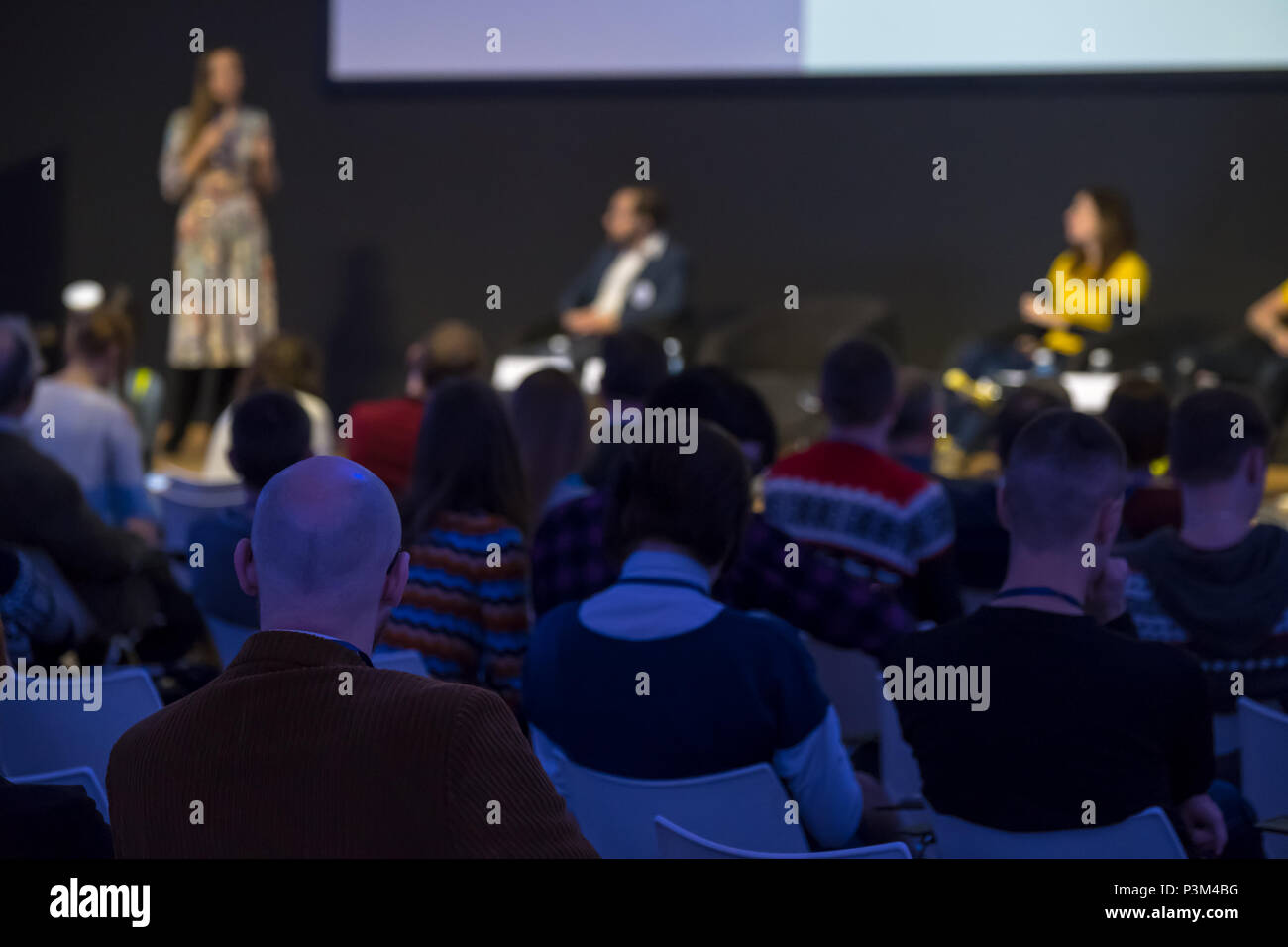 Audience listens to the lecturer Stock Photo - Alamy