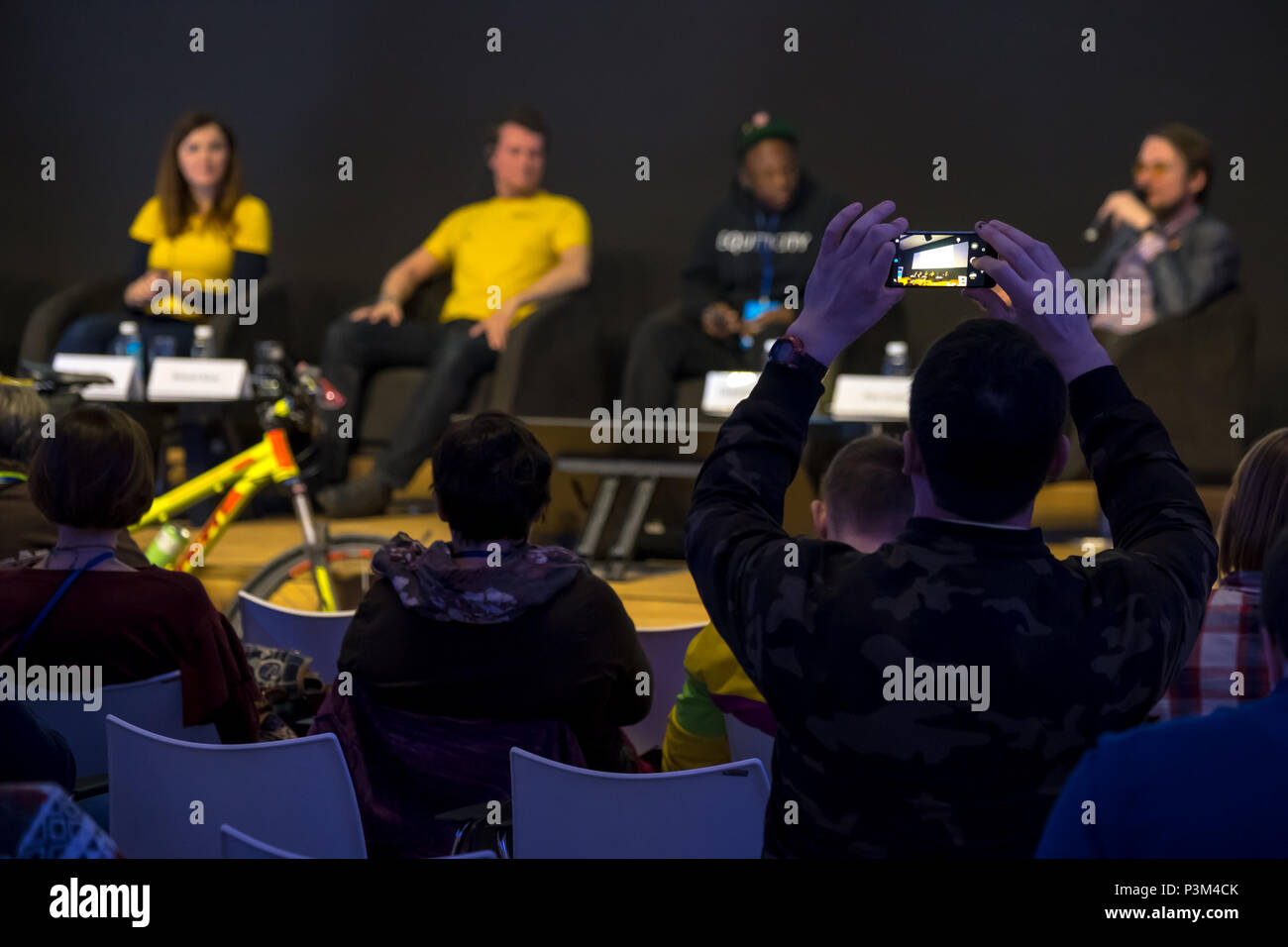 Audience listens to the lecturer Stock Photo - Alamy