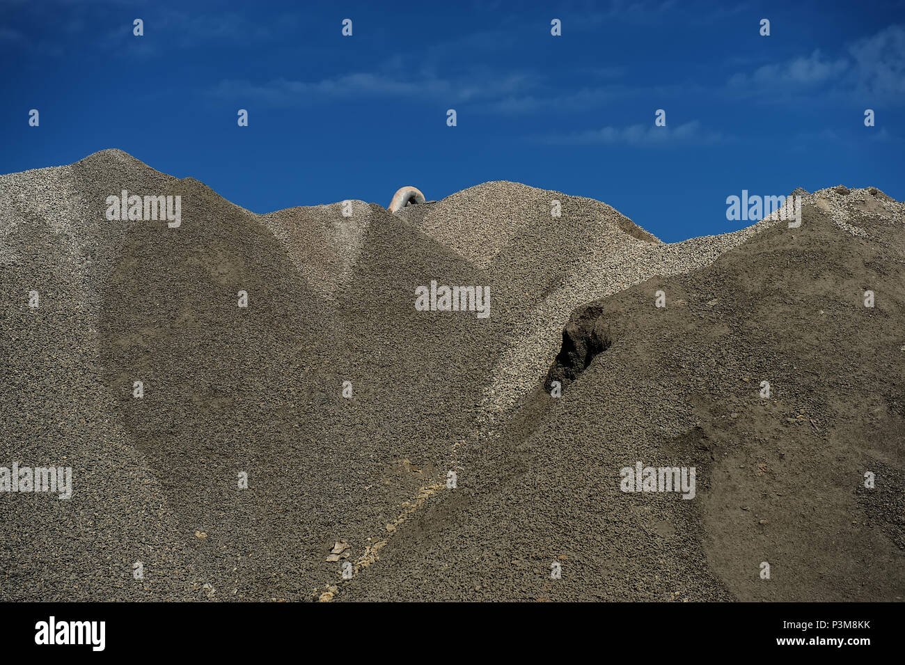 industrial warehouse of raw materials for cement production and a gas