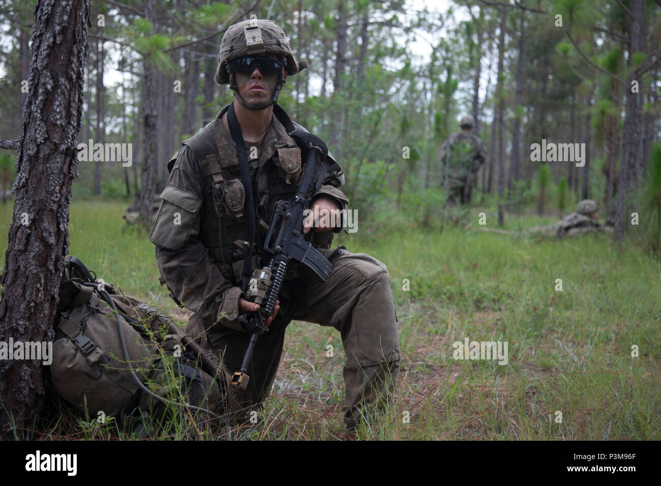 A U.S. Army Ranger student, assigned to the Airborne and Ranger Training Brigade, pulls security
