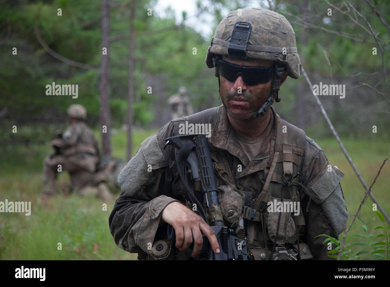 A U.S. Army Ranger student, assigned to the Airborne and Ranger Training Brigade, pulls security