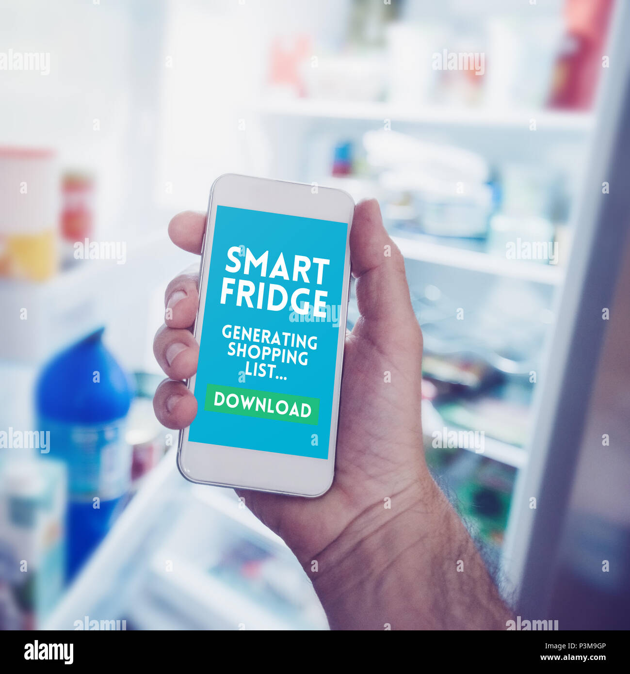 Internet of things, smartphone connecting with refrigerator to generate smart shopping list. Home kitchen appliance connecting with mobile phone and e Stock Photo