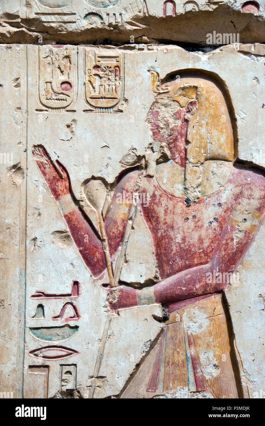 Colorfully painted bas relief stone carvings at the Great Osiris Temple, Abydos, Egypt. Stock Photo