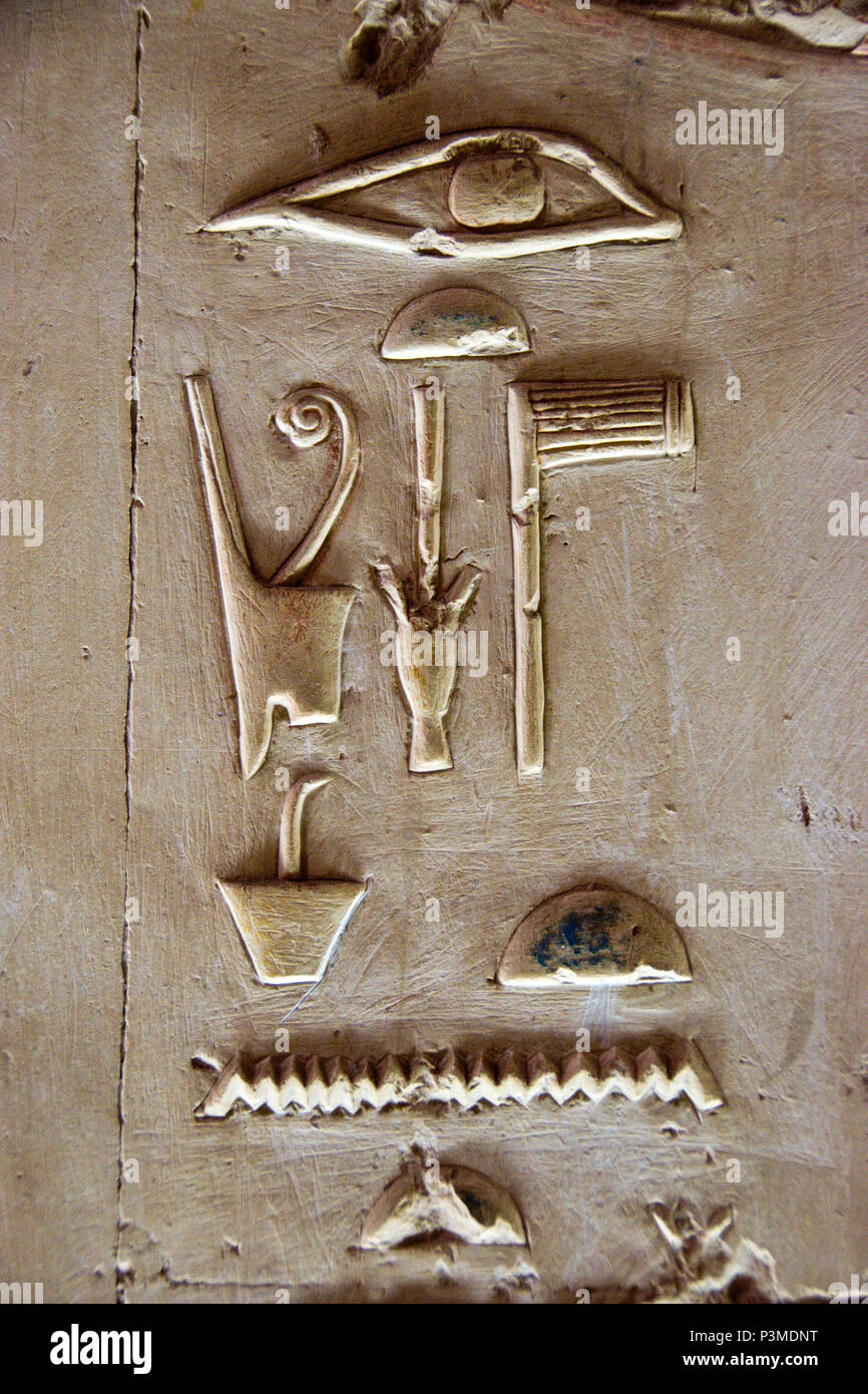 Bas relief carvings of hieroglyphs inside the Great Osiris Temple at Abydos, Egypt. Stock Photo