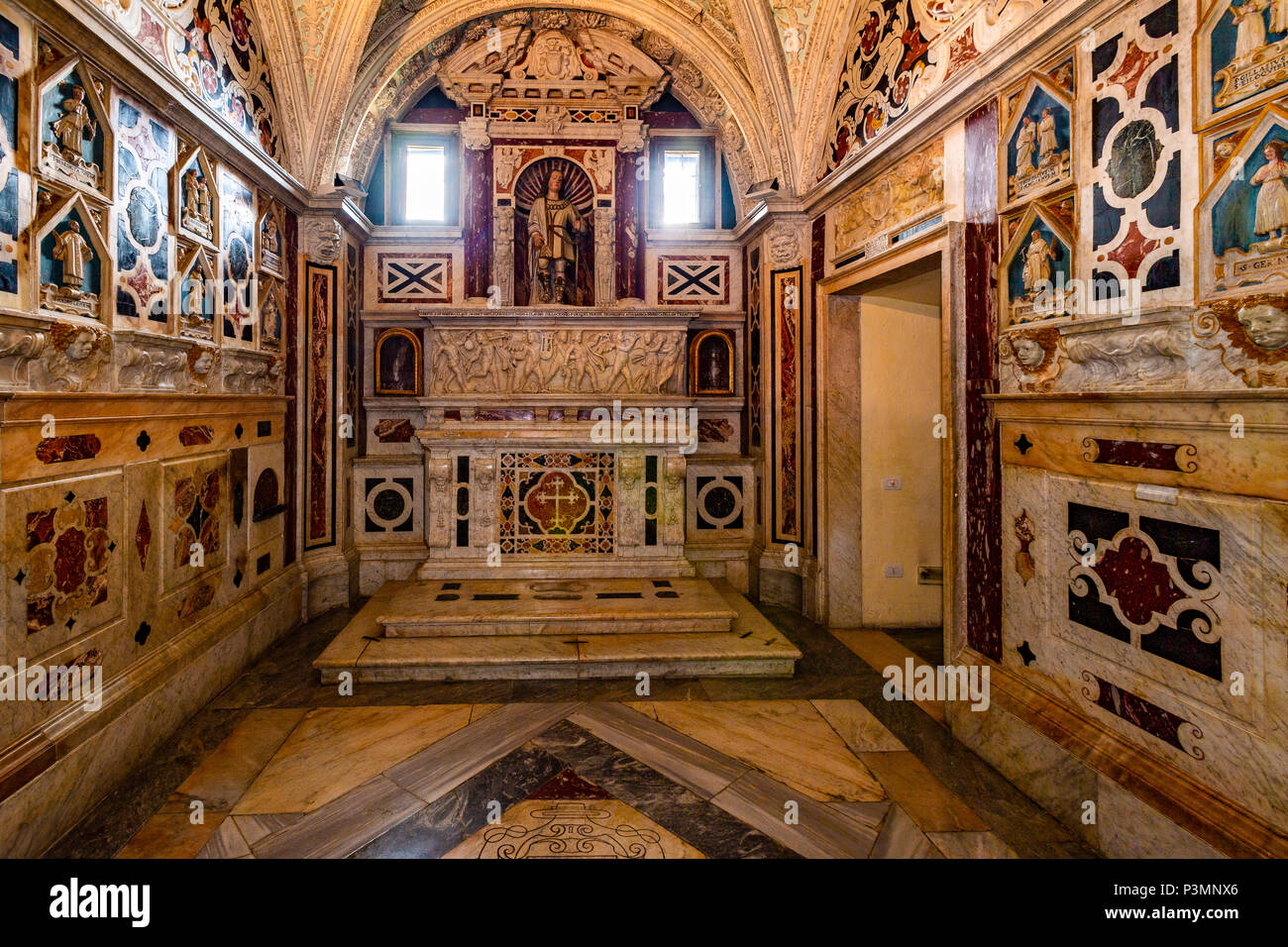 Italy Sardinia Cagliari Castello ( Casteddu ) District - Santa Maria Cathedral - sanctuary of the martyr saints ( Crypte  ) -chapel of Saint Saturninus -Statue of St Saturninus and Roman Sarcophagus Stock Photo