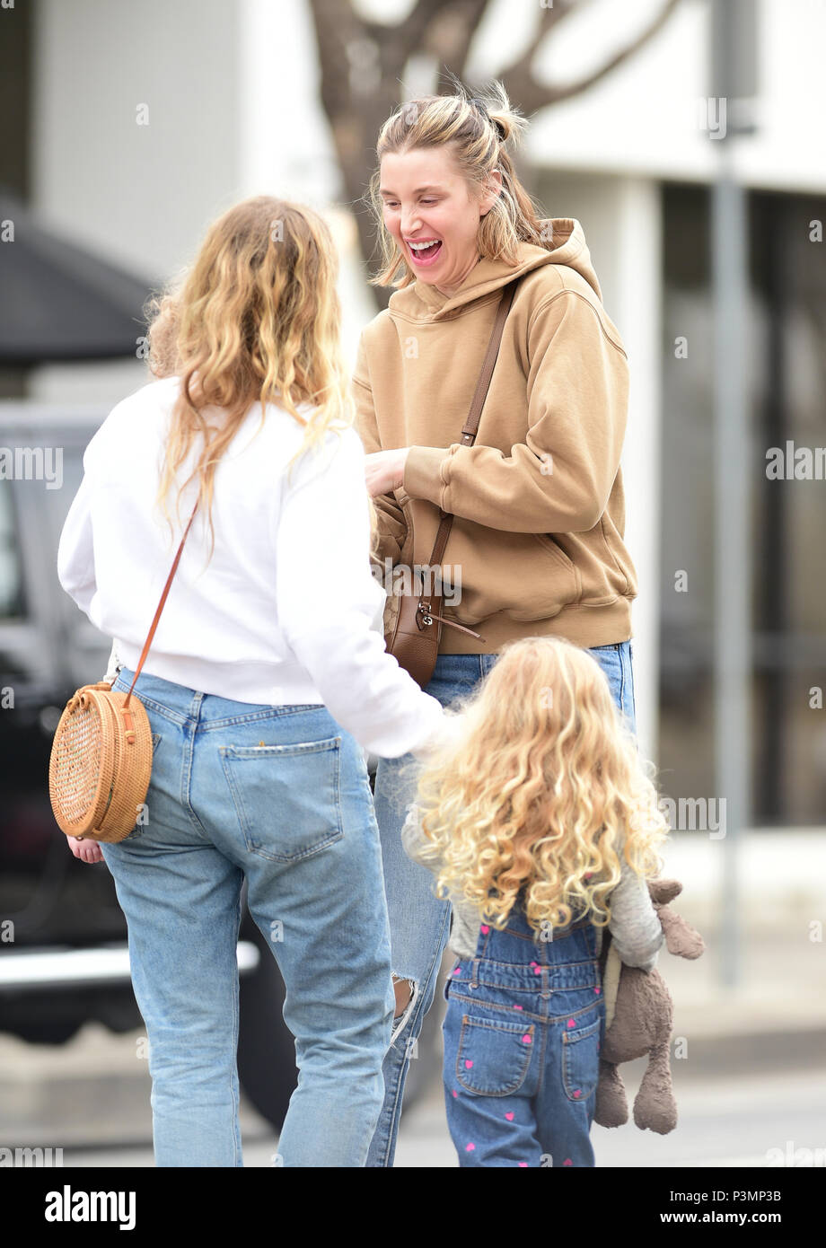 Whitney Port greets her son Sonny after picking up lunch at Joan's on