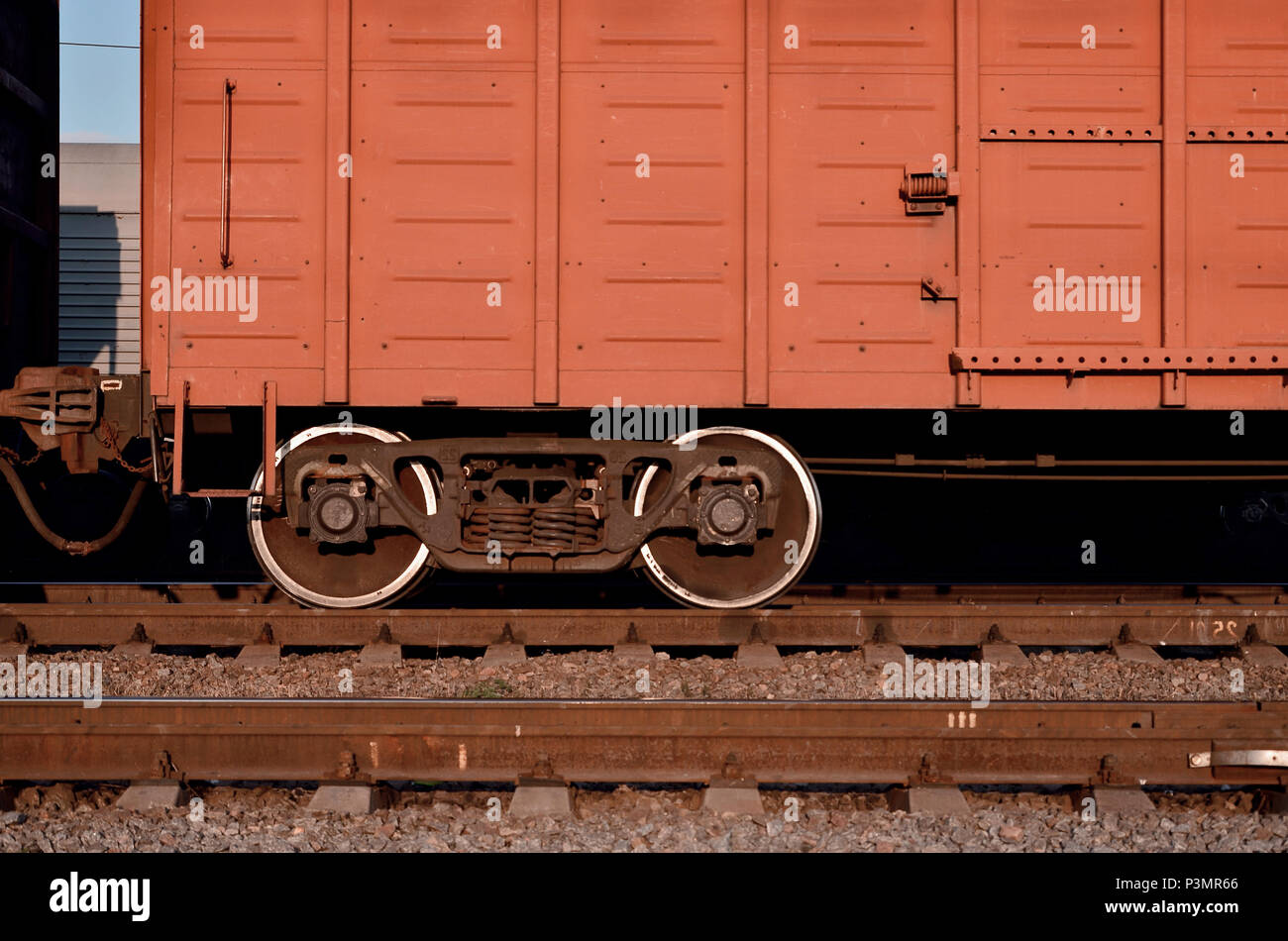 Detailed photo of railway freight car. A fragment of the component