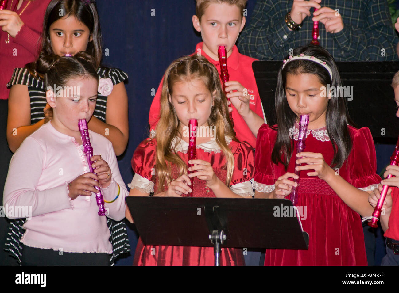 Tween years 9-10-11 year old children perform concert for parents and classmates in school  © Myrleen Pearson....Ferguson Cate Stock Photo