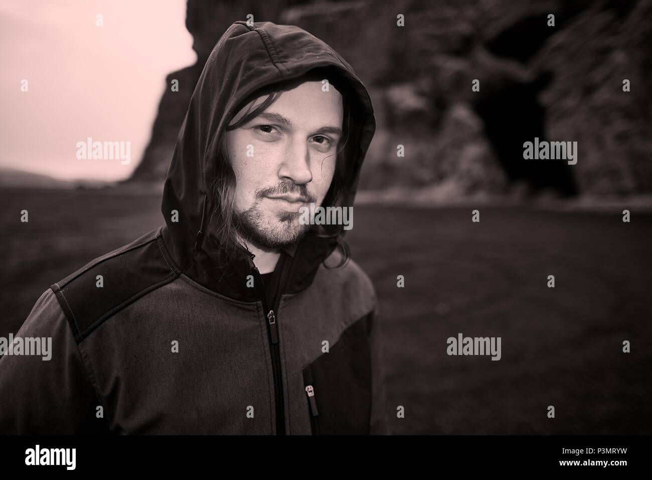 Hooded man in Iceland Stock Photo