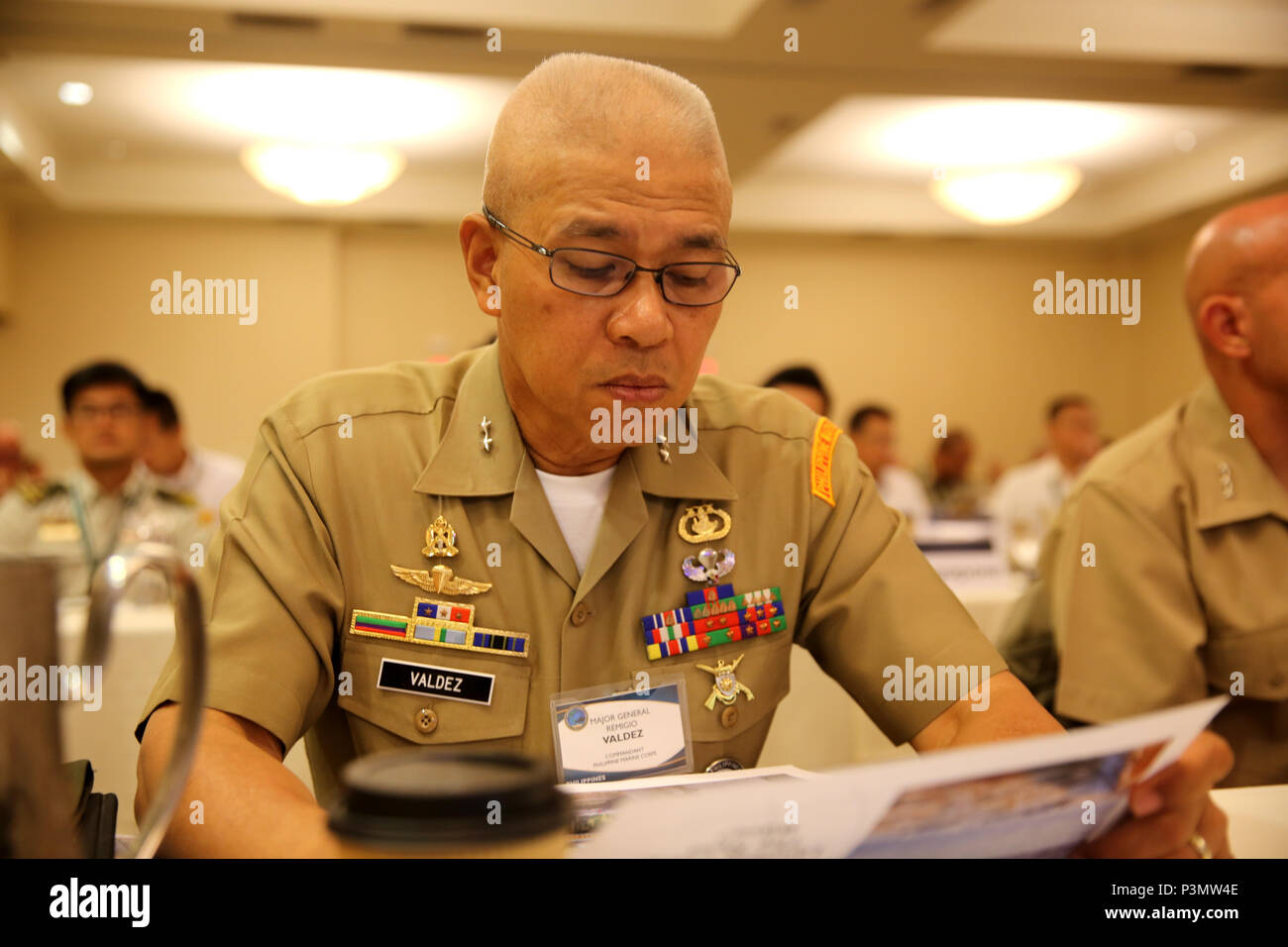 SAN DIEGO Calif. - Major General Remigio Castro Valdez (right), commandant of the Philippine Marine Corps, takes part in the Pacific Command Amphibious Leaders Symposium 2016 conference in San Diego, Calif., July 11, 2016. PALS brings together senior leaders of allied and partner nations throughout the Indo-Asia-Pacific region. The symposium consists of academic and group discussions, a Table-Top Exercise and an amphibious landing demonstration. (U.S. Marine Corps photo by Cpl. Demetrius Morgan/ RELEASED) Stock Photo
