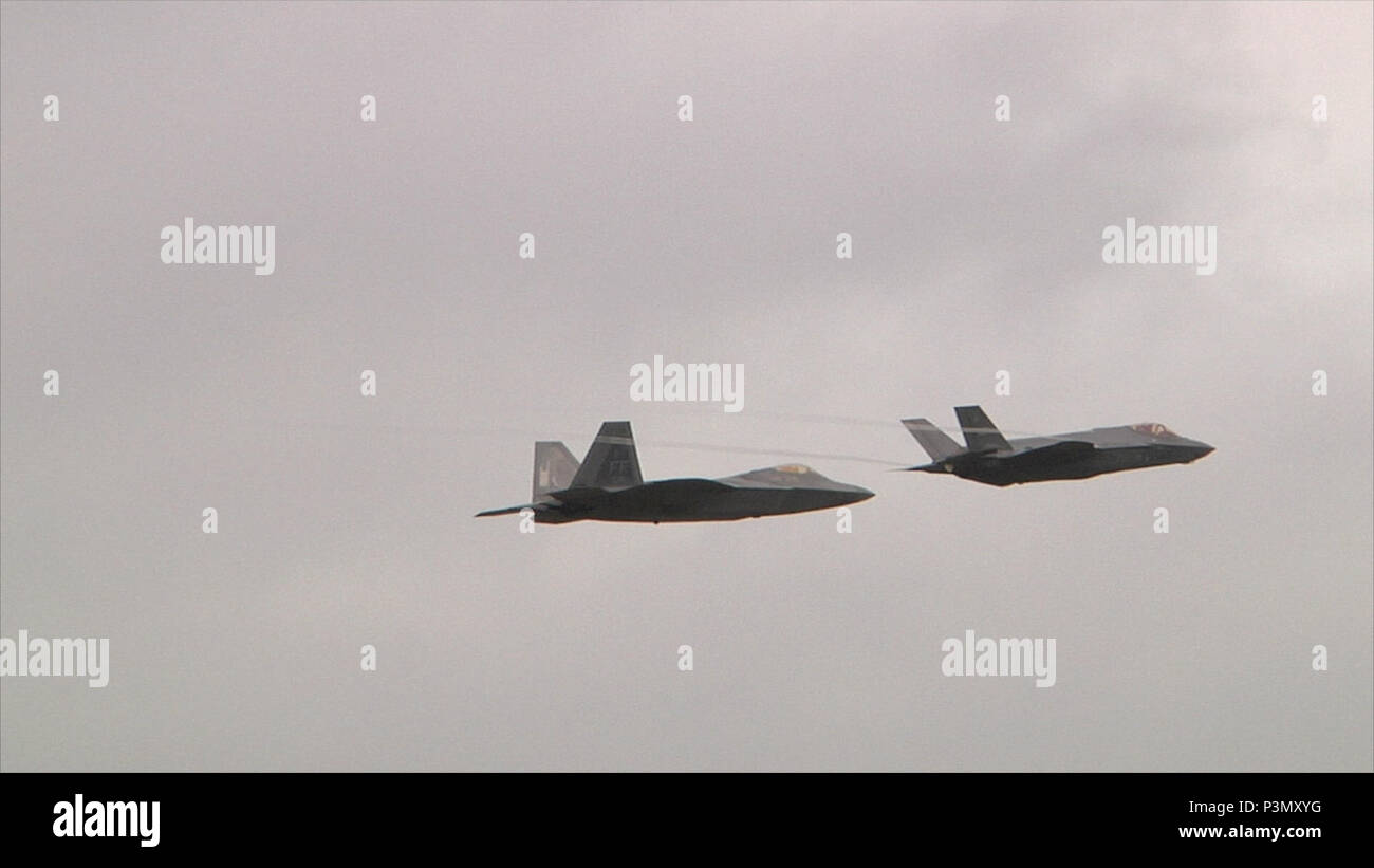 The Lockheed Martin F-35A Lightning II and the Lockheed Martin F-22 ...