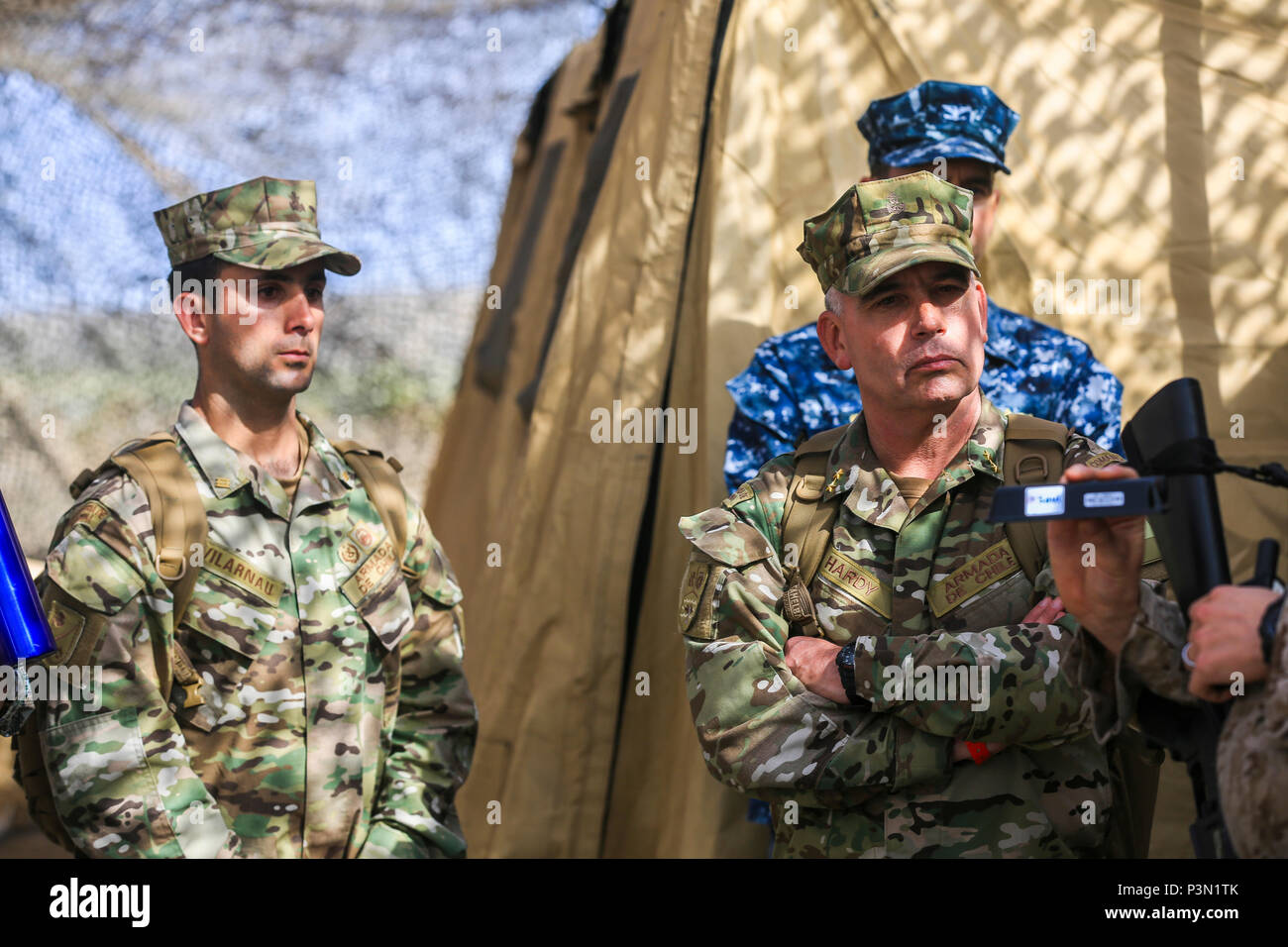 Mexican Navy Vice Adm. Rafael Lopez Martinez, right, Marine Corps Coordinator General of the Mexican Secretariat of the Navy, listens to a Command Operations Center brief during the USPACOM Amphibious Leaders Symposium (PALS) on Camp Pendleton, Calif., July 13, 2016. PALS brings together senior leaders of allied and partner nations from the Indo-Asia-Pacific region to discuss key aspects of maritime/amphibious operations, capability development, crisis response, and interoperability. Twenty-two allied and partnered nations, including the U.S. are participating. (U.S. Marine Corps photo by Cpl. Stock Photo