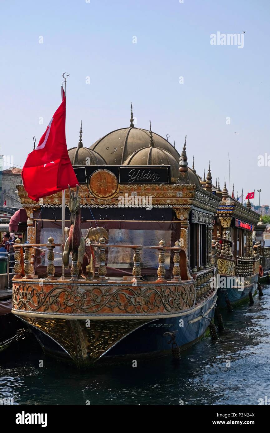 ISTANBUL, TURKEY - MAY 24 : View of Chinese floating restaurants along the Bosphorus in Istanbul Turkey on May 24, 2018. Two unidentified people Stock Photo