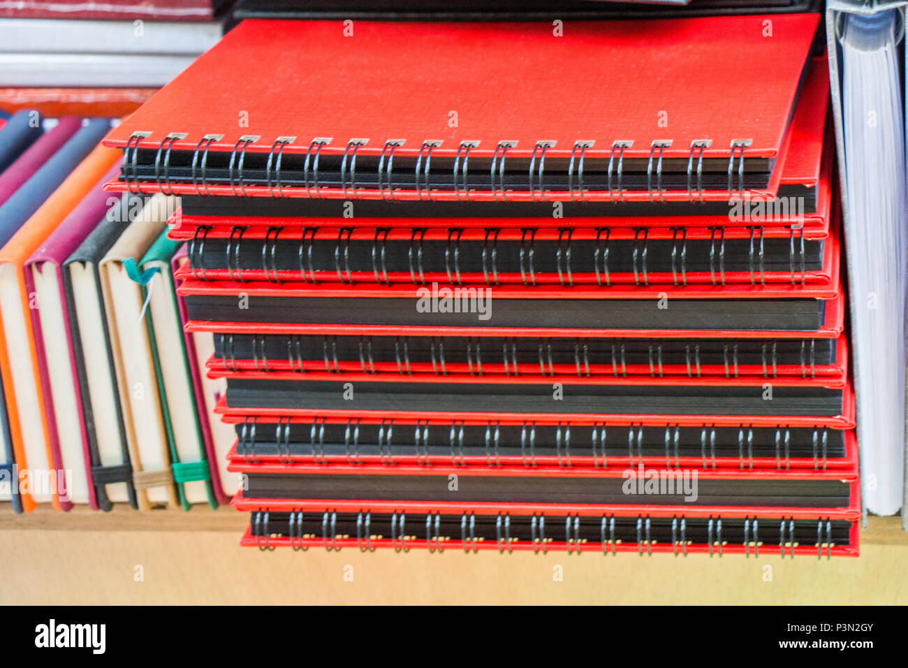 Set of color note books in the view Stock Photo - Alamy
