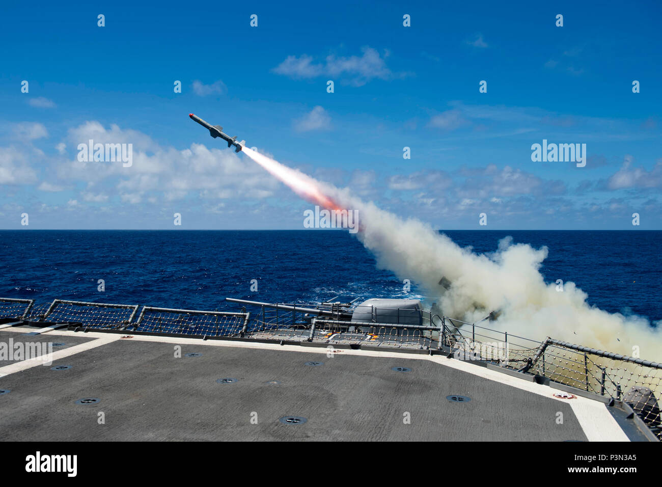 160714-N-OL837-067  PACIFIC OCEAN (July 14, 2016) Sailors aboard the guided-missile cruiser USS Princeton (CG 59) fire an RGM-84 Harpoon anti-ship missile during an international sinking exercise, or SINKEX, for Rim of the Pacific 2016. Twenty-six nations, more than 40 ships and submarines, more than 200 aircraft, and 25,000 personnel are participating in RIMPAC from June 30 to Aug. 4, in and around the Hawaiian Islands and Southern California. The world's largest international maritime exercise, RIMPAC provides a unique training opportunity that helps participants foster and sustain the coope Stock Photo