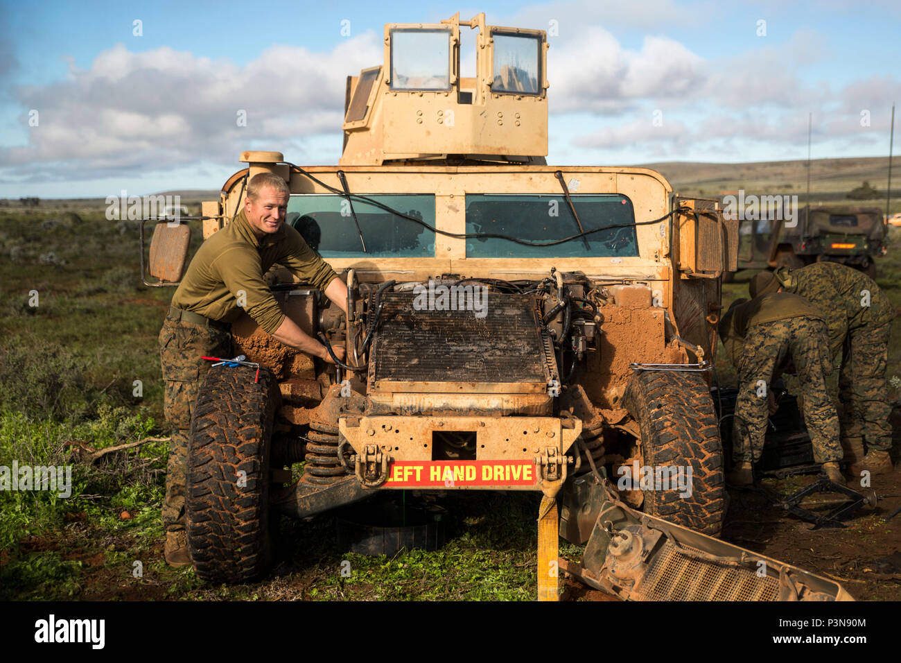 Cpl. Liam D. Fieldsted, an automotive maintenance technician, fixes a humvee during Exercise Hamel at Cultana Training Area, South Australia, Australia, July 8, 2016. Exercise Hamel is a trilateral training exercise with Australian, New Zealand, and U.S. forces to enhance cooperation, trust, and friendship. Fieldsted, from Mariposa, California, is with Headquarters and Service Company, 1st Battalion, 1st Marine Regiment, Marine Rotational Force – Darwin. (U.S. Marine Corps photo by Cpl. Mandaline Hatch/Released) Stock Photo