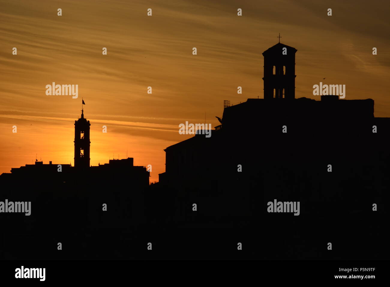shadow of buildings in rome while sunset Stock Photo