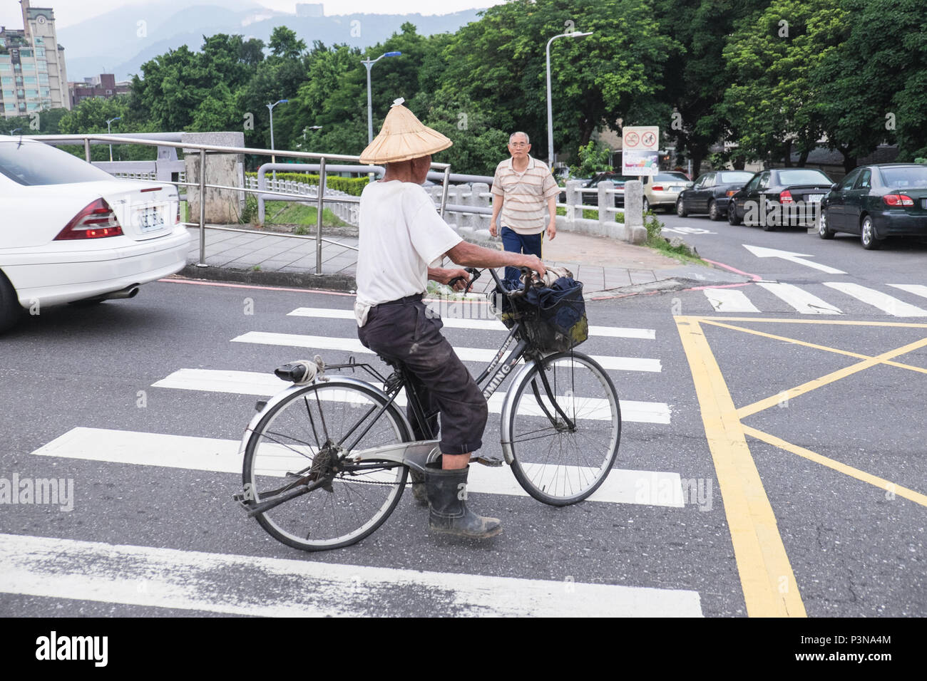Old,style,hat,bicycle,riding,bike,Taipei City,Taipei,Taiwan,Republic of China,ROC,China,Chinese,Asia,Asian, Stock Photo